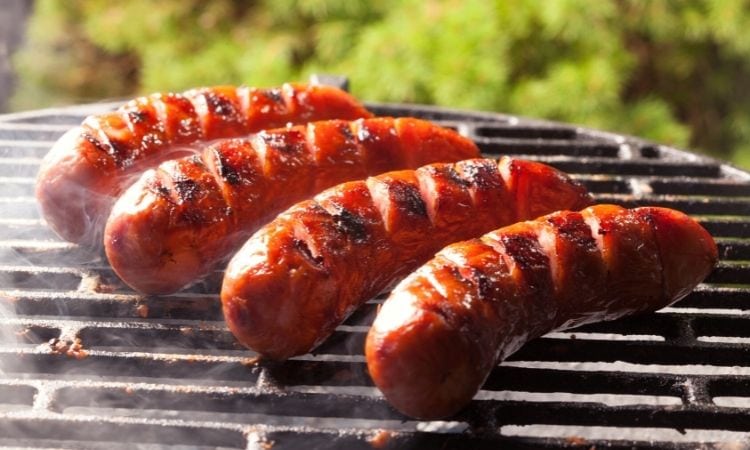 sausages on a grill