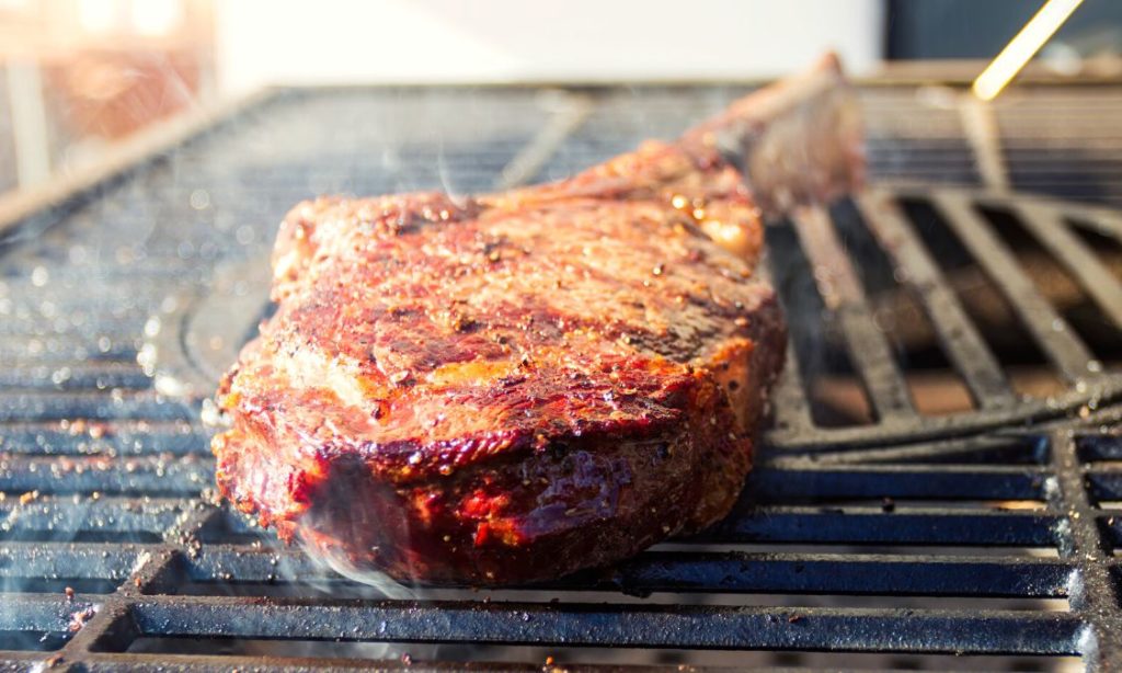 tomahawk steak on a gas grill