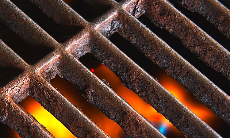 rusty cast iron grill grate