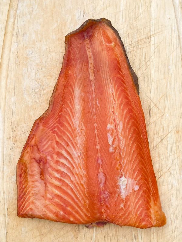 Traeger Smoked Trout Filet on a cutting board